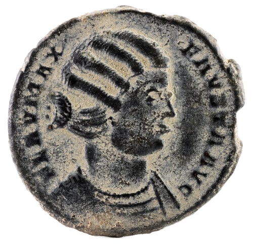 Preview: Closeup shot of an ancient Spanish coin with empress Fausta inscription