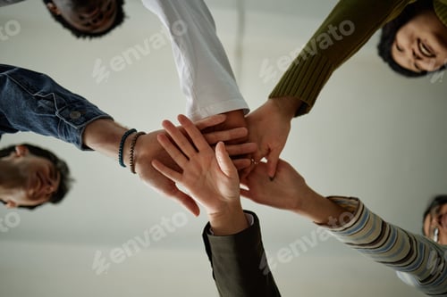 Preview: Diverse Teenagers Stacking Hands during Counseling Session for Team Building