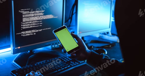 Preview: A male hacker is using a computer to hack data to demand ransom from victims.