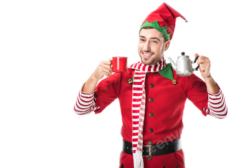 Preview: happy man in christmas elf costume holding red cup and metal kettle isolated on white