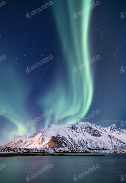 Preview: Aurora Borealis. Northern Lights over the high mountains and the sea. Natural landscape in Norway