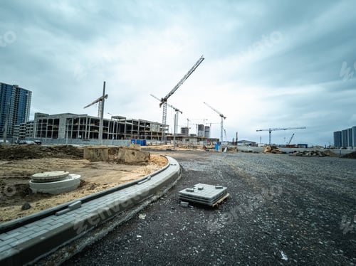 Preview: Minsk, Belarus - May 2022: construction of a large shopping center in a new microdistrict.