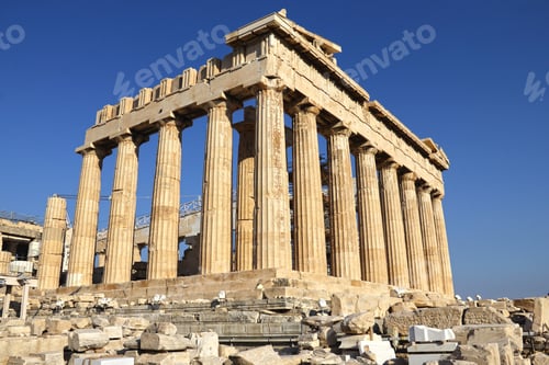 Preview: Low angle shot of the Acropolis against a cloudless blue sky in Athens, Greece