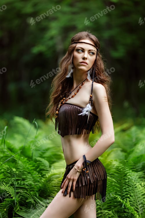 Preview: Close-up portrait of a woman hunter with war paint on her face