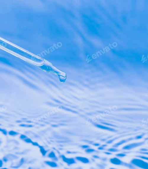 Preview: a pipette with a drop of liquid dripping from it