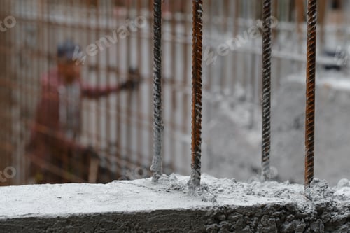 Preview: Concreate wall made with reinforcement on construction site, metal rods