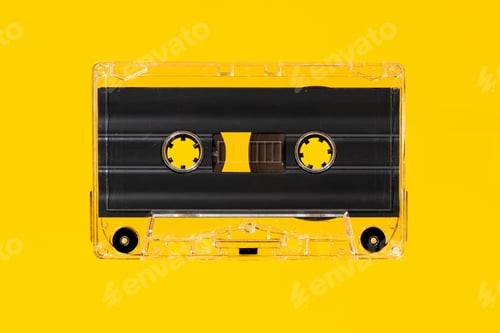 Preview: Blank Vintage audio cassette isolated on yellow background. Template mock up