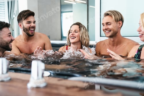 Preview: Happy friends enjoying vacations in jacuzzi luxury house