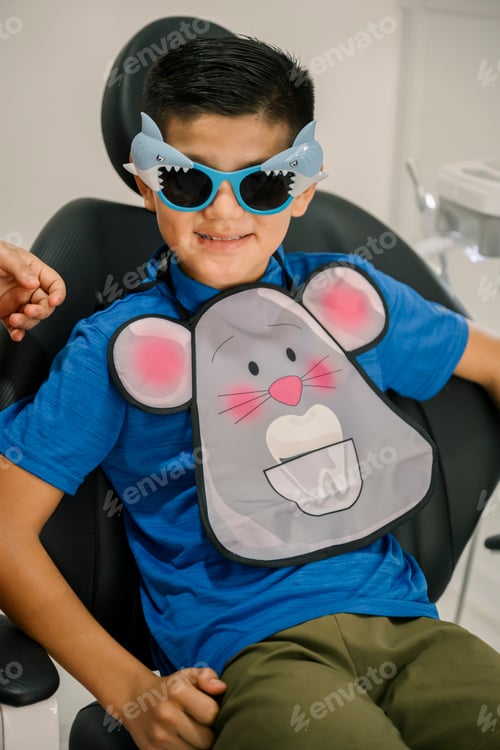 Preview: Young boy smiling at dentist office