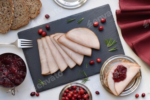 Overhead View of Turkey Slices with Cranberry Sauce