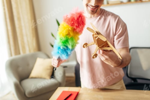 Preview: Dreamer Man With Toy Airplane and Rainbow Pom Pom