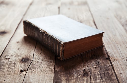 Preview: Vintage book on old wooden table