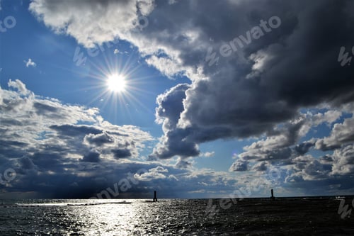 Preview: Stormy sky with sun over Lake Michigan