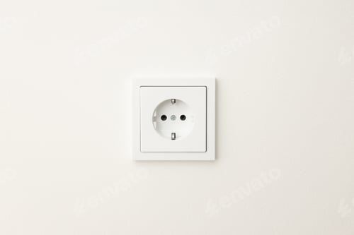 Preview: Close up view of a standard electrical outlet on a plain wall
