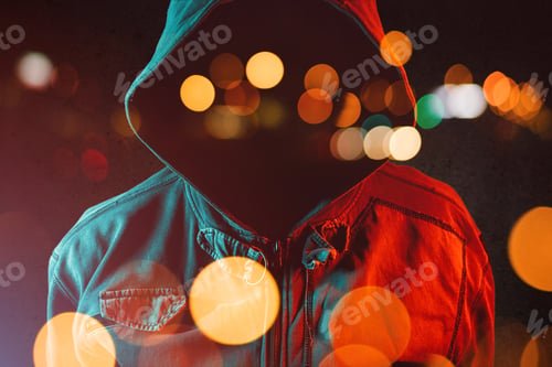 Preview: Faceless hooligan with hoodie in urban surrounding