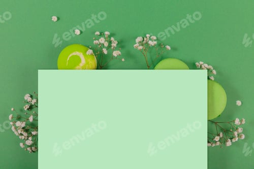 Preview: Mock up with macarons cakes on green background