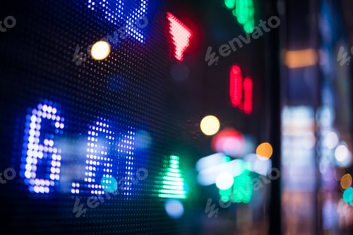 Preview: Financial stock market numbers and city light reflection