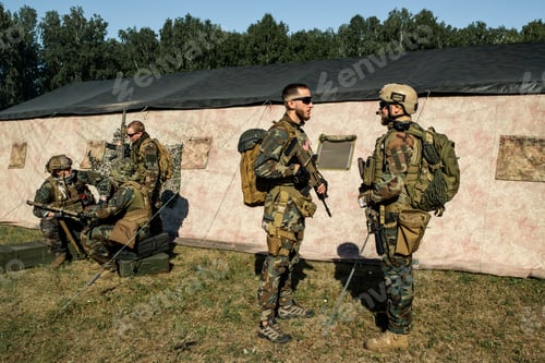 Preview: Officer preparing soldier for military operation