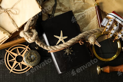 Preview: Columbus Day. Accessories for sailors on a dark background