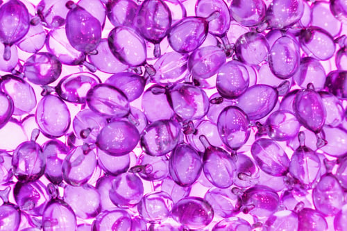 Preview: hair and skin vitamin serum capsules in container, background and texture