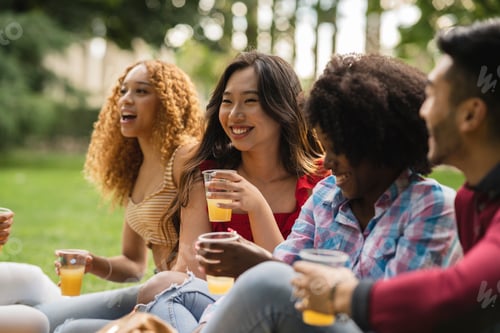 Preview: Close-Up of Joyful Young Friends Laughing Together in Park