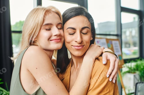 Preview: Confident couple embrace in modern agency