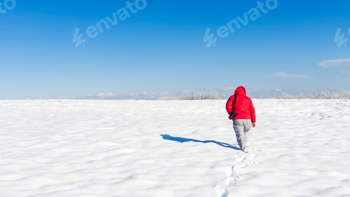 Preview: Nature photographer on a snowy field