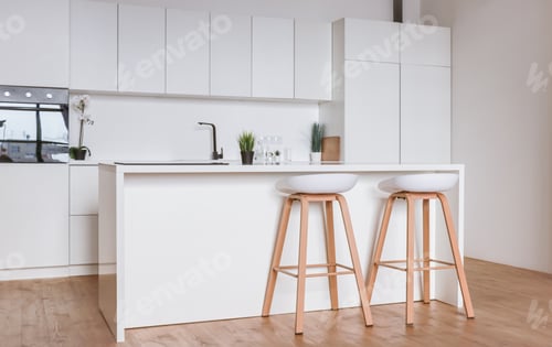 Preview: Minimalistic light interior of modern kitchen with island and high chairs