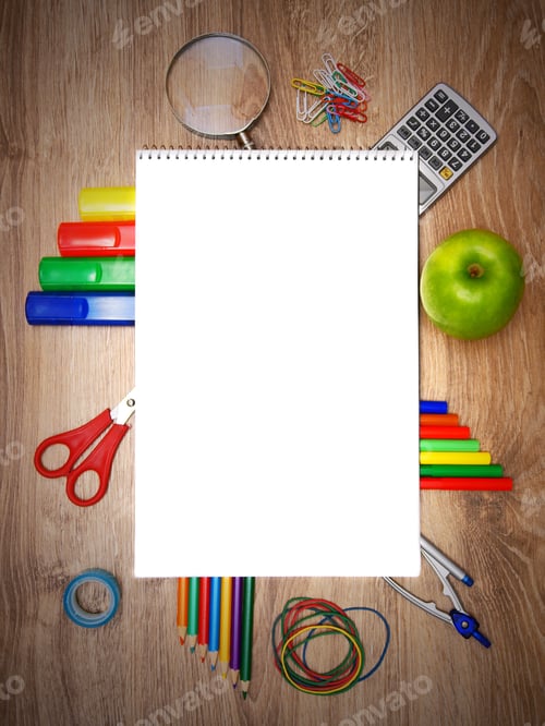 Preview: School accessories on a wooden background.