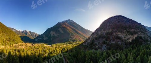 Preview: Canadian Mountain Landscape during sunny sunset. Aerial Background