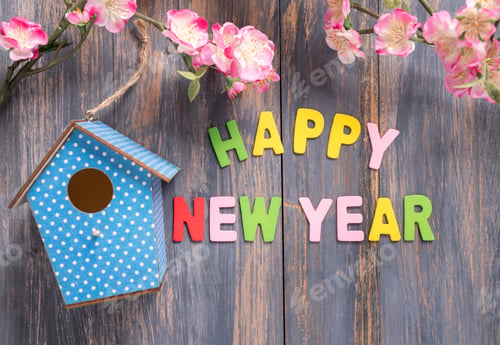 Preview: Letter Happy New Year On Wood Texture Background