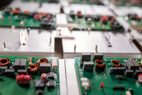 Preview: Microcircuits and components lie on metal plates