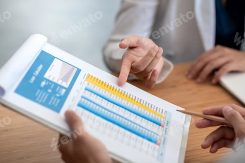 Preview: Business people working together to brainstorm ideas pointing graph office.