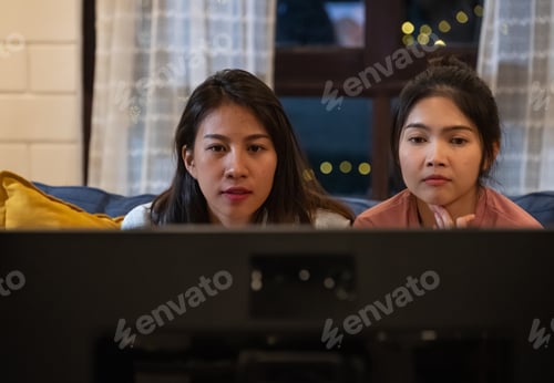Preview: asian woman lesbian watching television at home night time