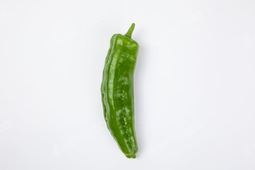 Preview: Closeup shot of a single green pepper isolated on white background