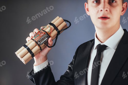 Preview: Man terrorist in a black suit with explosives