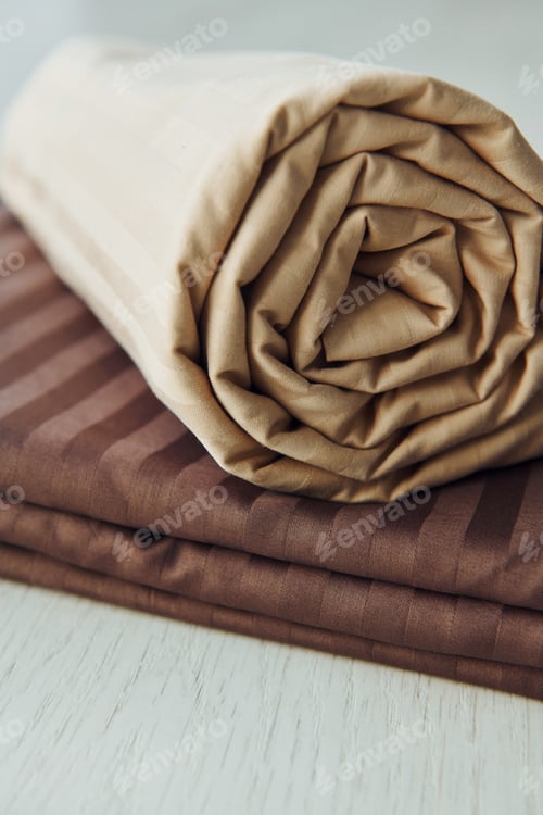 Preview: Close up view of new bedroom clothes that lying down