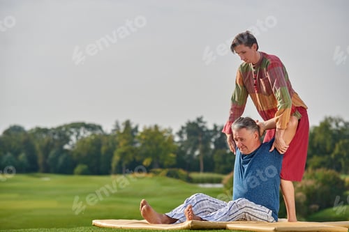 Preview: Thai massage on the park lawn.