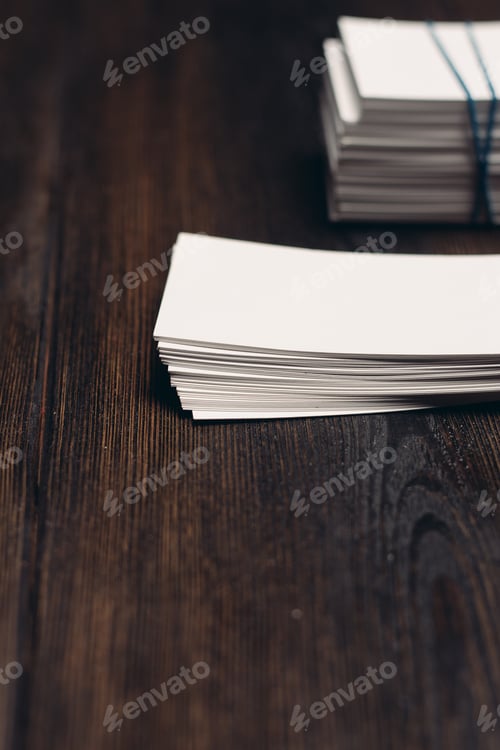 Preview: stack of white business cards and pen on office desk wooden background