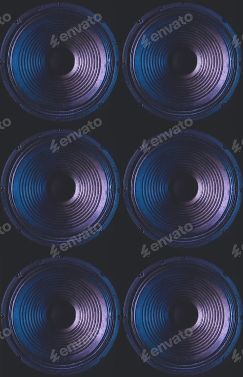Preview: Close-up of speakers membrane on black background with colored lighting.