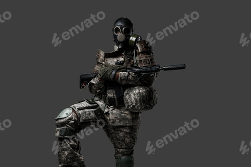 Preview: African military man dressed in uniform and gas mask
