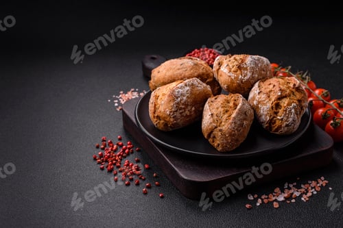 Preview: Fresh baked bread buns with salt, spices, seeds and grains