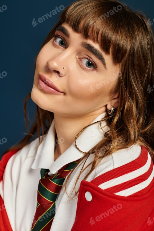 Preview: Young woman in stylish school attire radiating joy and confidence in a vibrant setting