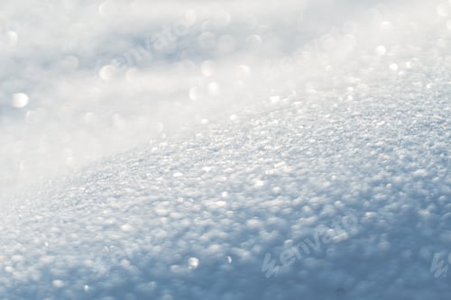 Preview: Close-up snow field background. Snow texture. Winter sunny day