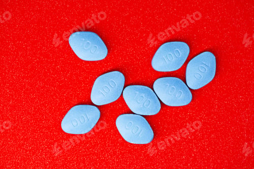 Preview: Pill for men's health and Valentine's Day background.