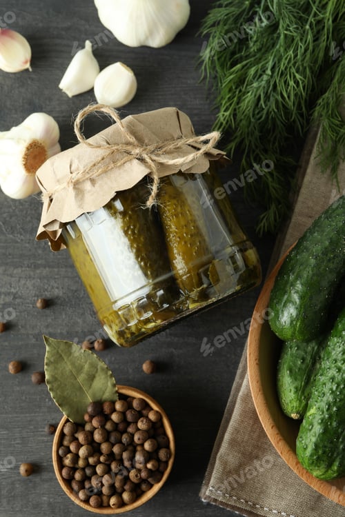 Preview: Fresh pickles and ingredients on dark wooden table