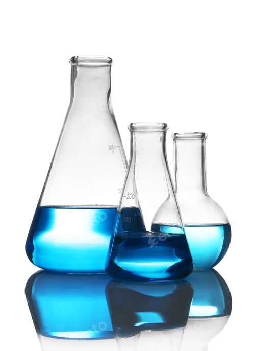 Preview: Laboratory glassware with liquid on table against white background. Chemical analysis