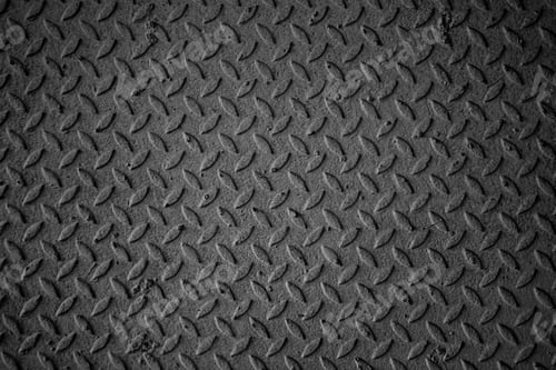 Preview: A black and white photo of a metal surface with a pattern of squares