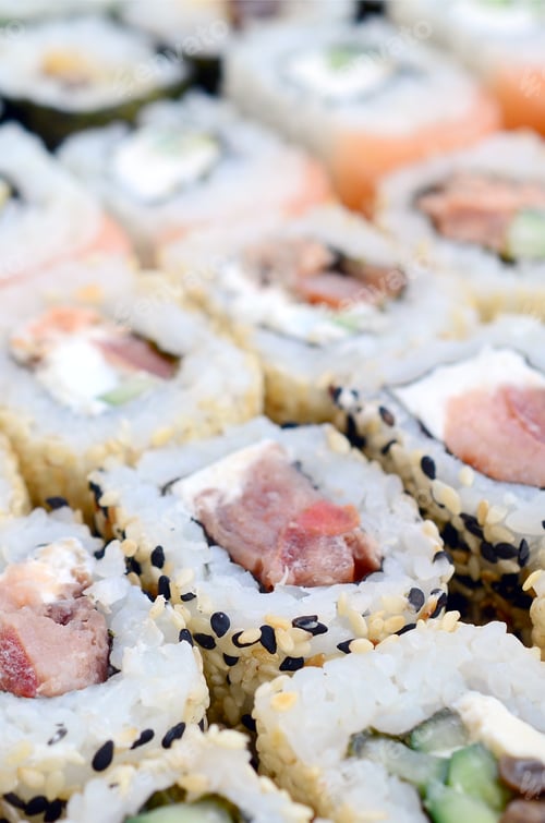 Preview: Close-up of a lot of sushi rolls with different fillings