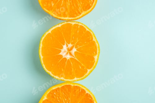 Preview: top view fresh tangerines on light-blue background color orange photo juice fruit citrus
